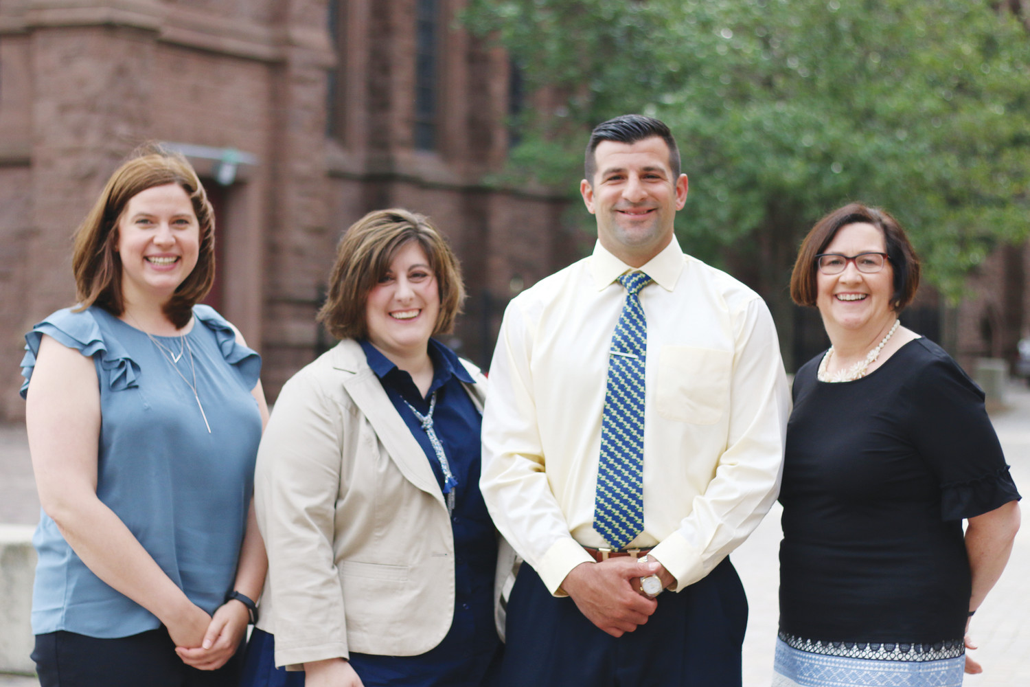 From left, earlier this summer, Jessica Walters, Erin Clark, Mark DeCiccio and Mary-Regina Bennett visit the Catholic School Office for a welcome meeting. Not pictured Maurice (Mo) Guernon and Susan Morrissey. The Diocese of Providence welcomed six new Catholic School principals to begin serving for the 2018-2019 school year.